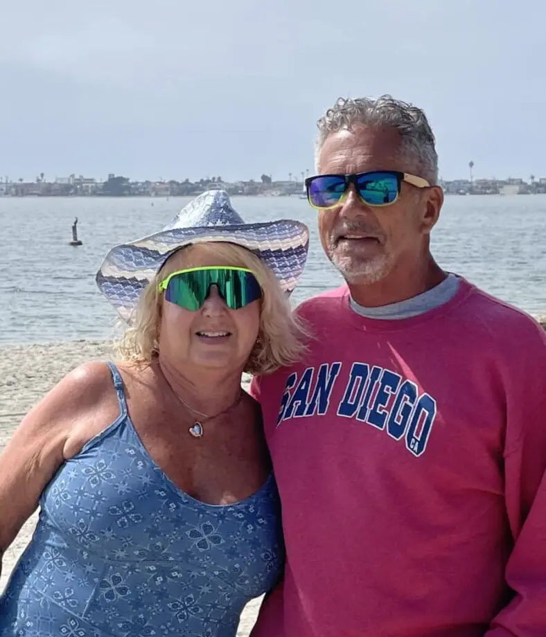 Alan and Dana on the beach in front of our San Diego homes scaled